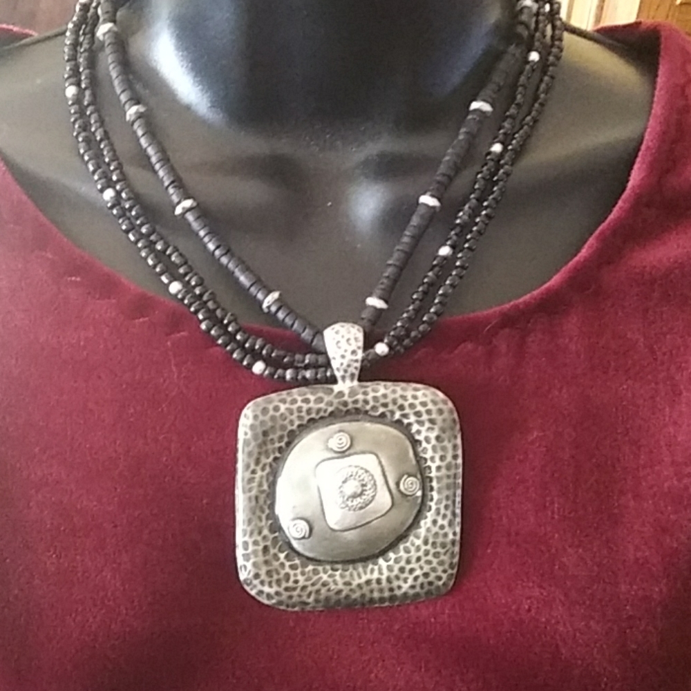 Artsy necklace with matching earrings.